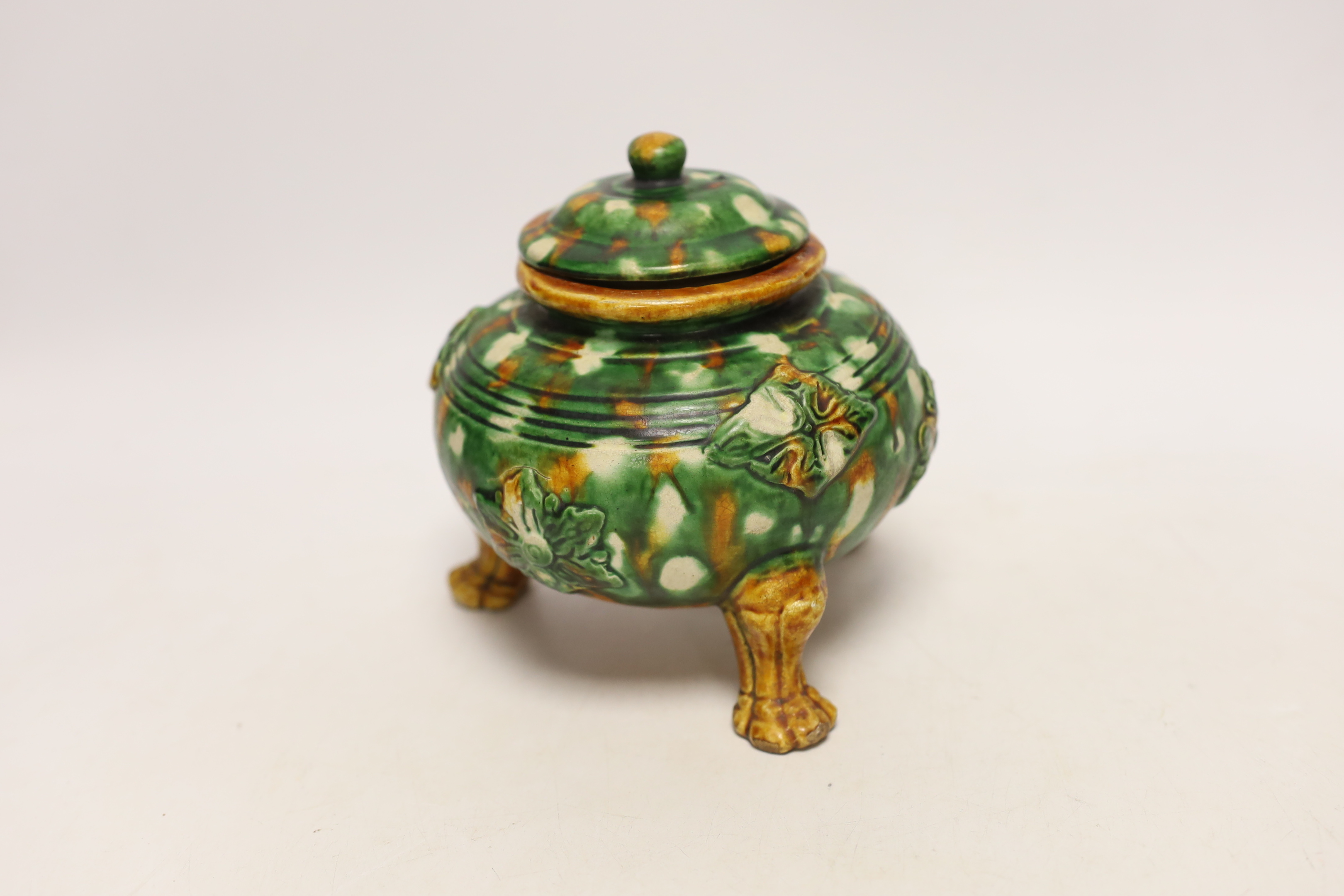 A Sancai three legged lidded pot, 13cm
